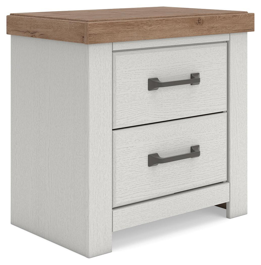 Two-drawer night stand with white cabinet, brown top, and two dark metal pull handles.