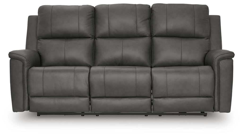 Dark gray power reclining sofa with three padded headrests and cushioned armrests
