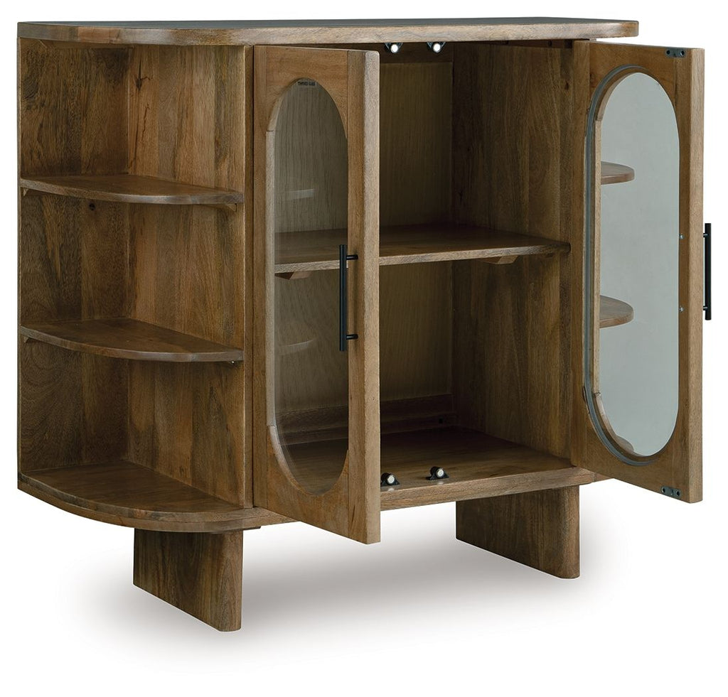Light brown wood cabinet with open shelves, oval door panel, and round mirror