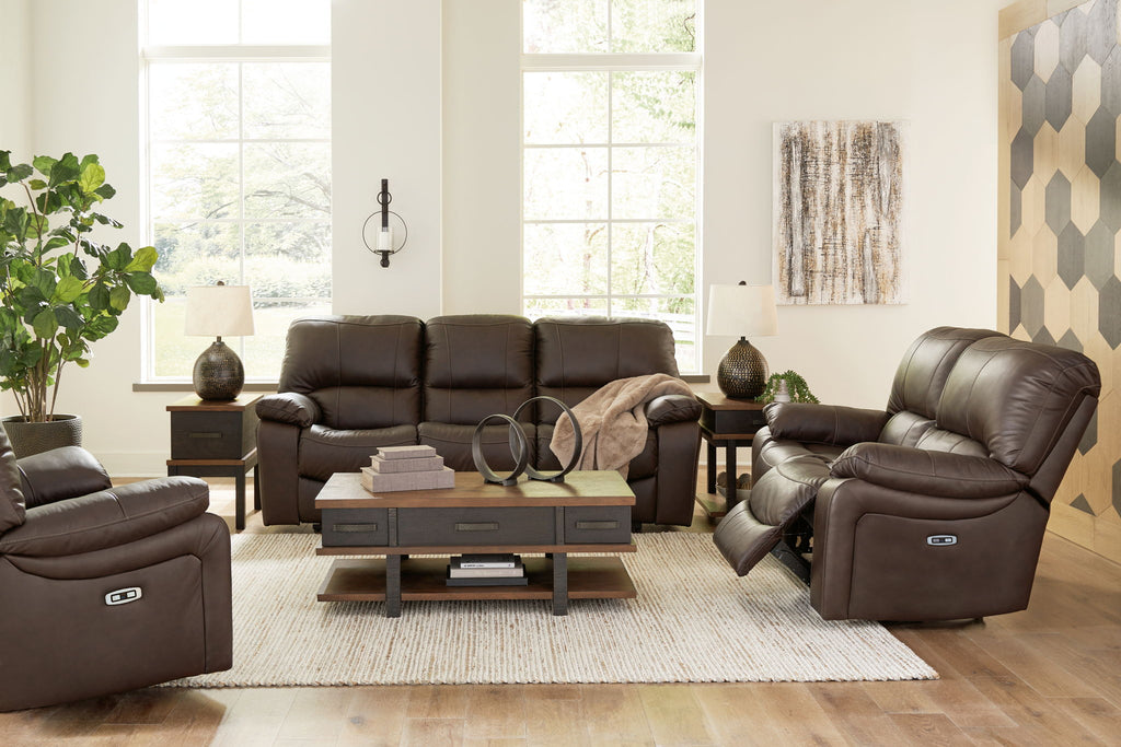 Dark brown reclining living room set with sofa and matching recliner chairs