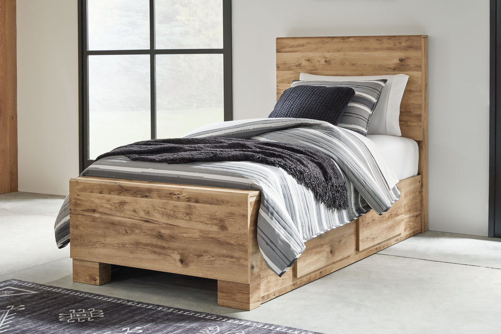 Beige storage bed with front drawer panels and a slatted headboard