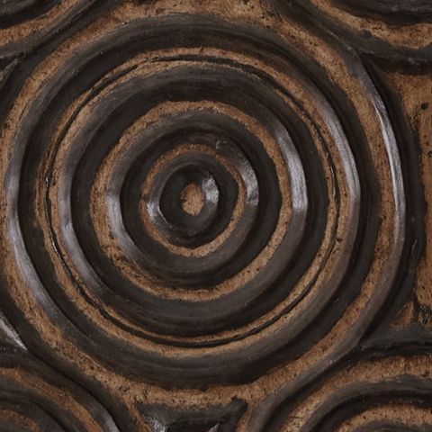 Carved antique brown spiral pattern on lamp base