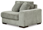 Fog corduroy corner chair with ribbed fabric, tufted back cushions, and wide armrests