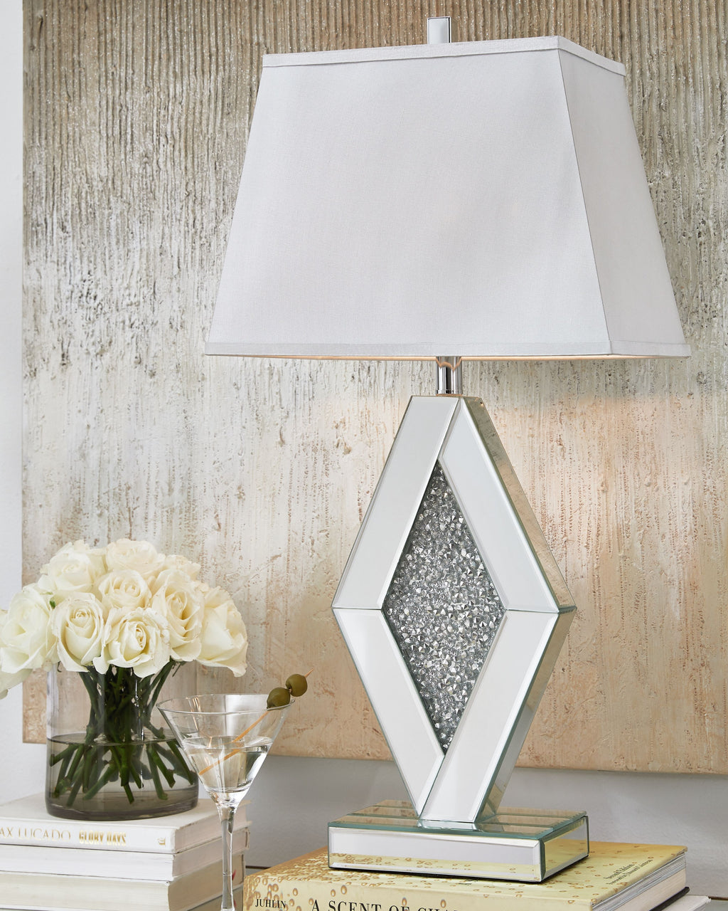Silver mirror table lamp with white fabric shade and textured diamond base