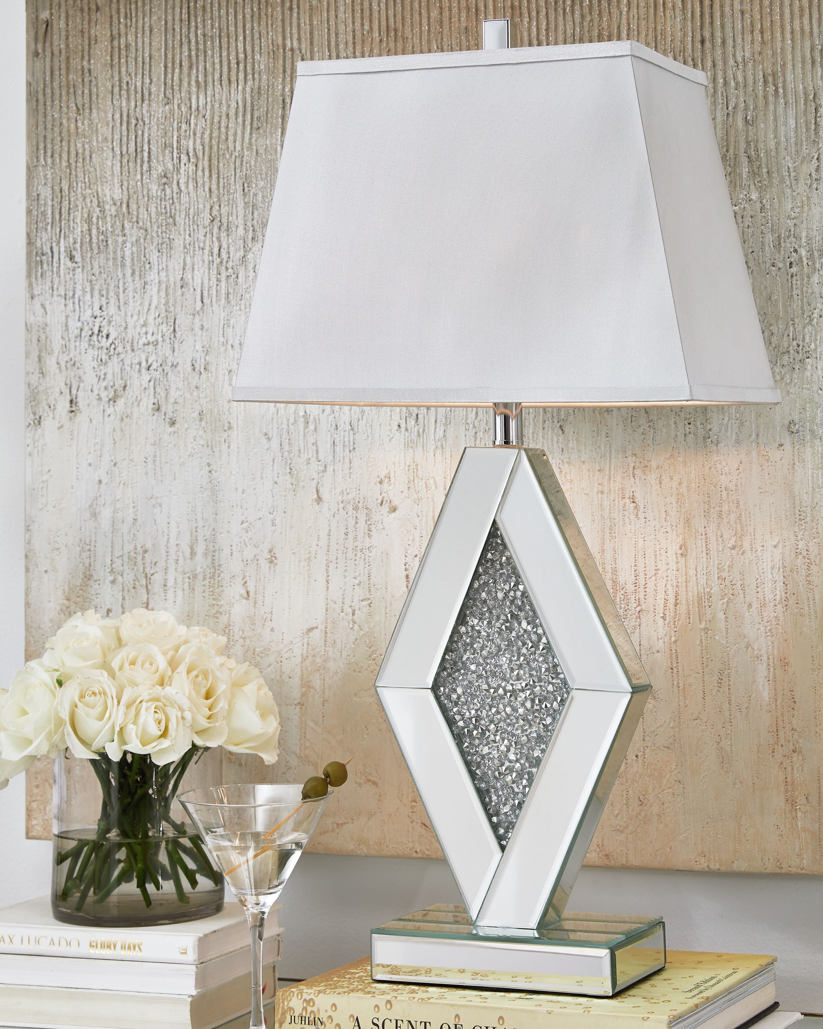Silver mirror table lamp with white fabric shade and textured diamond base
