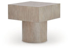 Light brown square table with flat top and pedestal base