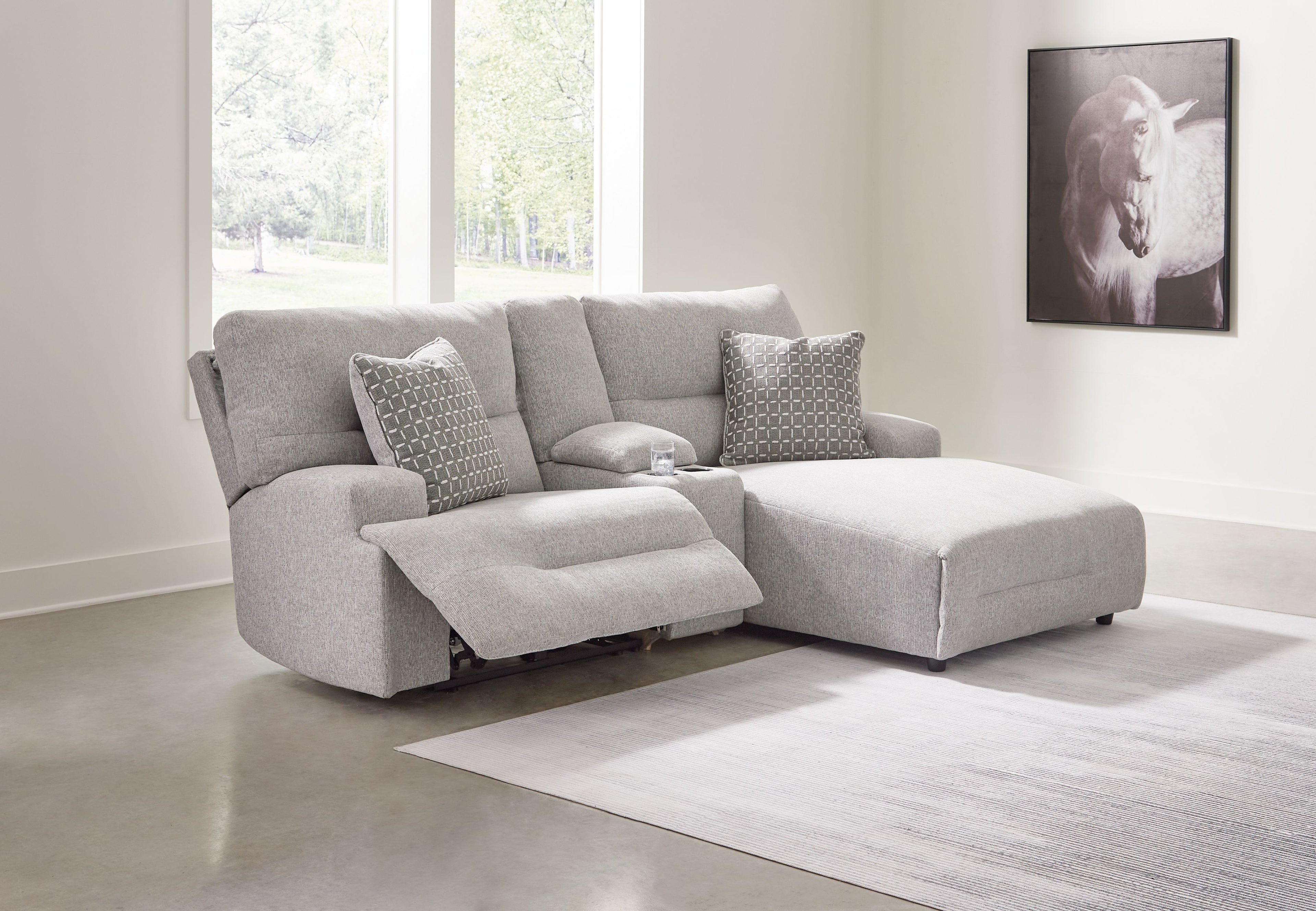 Pewter power reclining sectional sofa with chaise and two side recliner seats, corner view