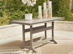 Rectangular counter-height dining table, medium brown wood, slatted surface and lower shelf.