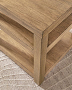 Natural wood end table corner detail with beveled edges and lower shelf