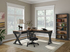 Home office desk set with brown worktops, black legs, swivel chair, and bookcase