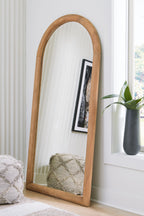 Arched floor mirror with wooden frame and clear reflective glass