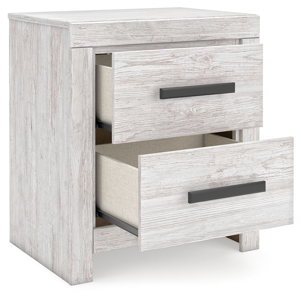 Whitewash two-drawer night stand with one drawer open and dark pulls