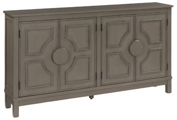 Warm gray accent cabinet with two paneled doors and round knobs, raised legs