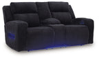 Power reclining loveseat with console armrests and adjustable headrests, black ribbed fabric