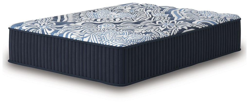 Blue mattress with navy ribbed sides and decorative blue-and-white top