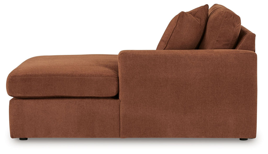 Rust-brown corner chaise with deep seat and tall back cushions