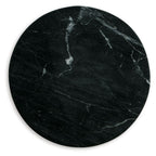 Round black stone-look tabletop with white veining