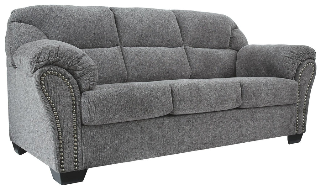 Pewter gray fabric sofa with tufted back, curved arms, and nailhead trim