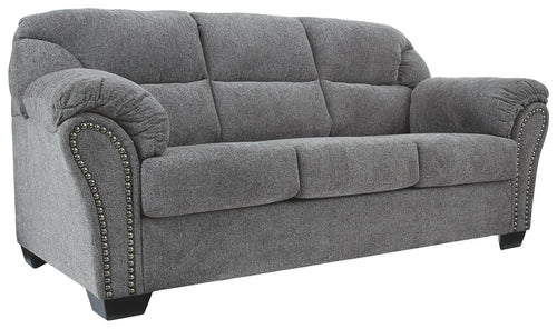 Pewter gray fabric sofa with tufted back, curved arms, and nailhead trim