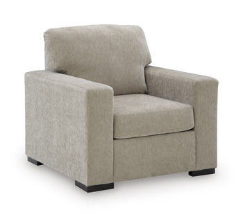 Gray upholstered lounge chair with wide arms and cushioned seat and back