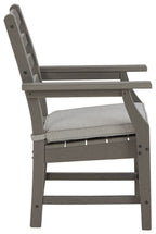 Gray arm chair with cushion, side view, slatted back and padded seat