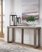 Sofa table with brown wood legs and ivory tabletop, open storage shelf