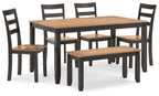 Dining room table set with bench, dark brown tabletop and dark chairs with slats