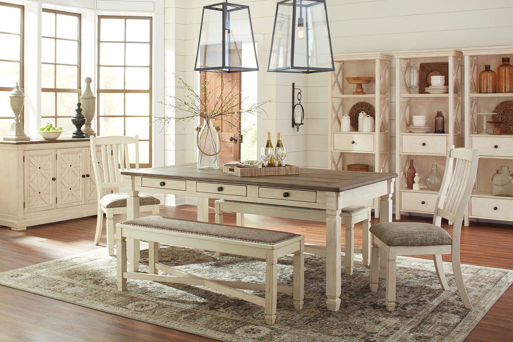 Rectangular dining table set with dark tabletop, beige chairs, and server cabinet drawers