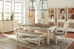 Rectangular dining table set with dark tabletop, beige chairs, and server cabinet drawers