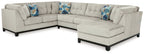 Beige L-shaped sectional sofa with chaise, accent pillows included