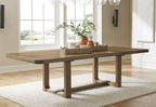 Light brown dining table with trestle base
