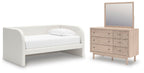White upholstered day bed set with matching dresser and mirror