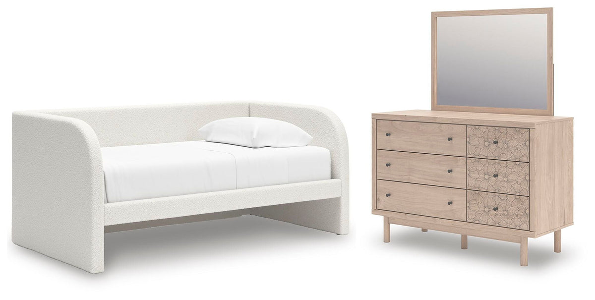 White upholstered day bed set with matching dresser and mirror