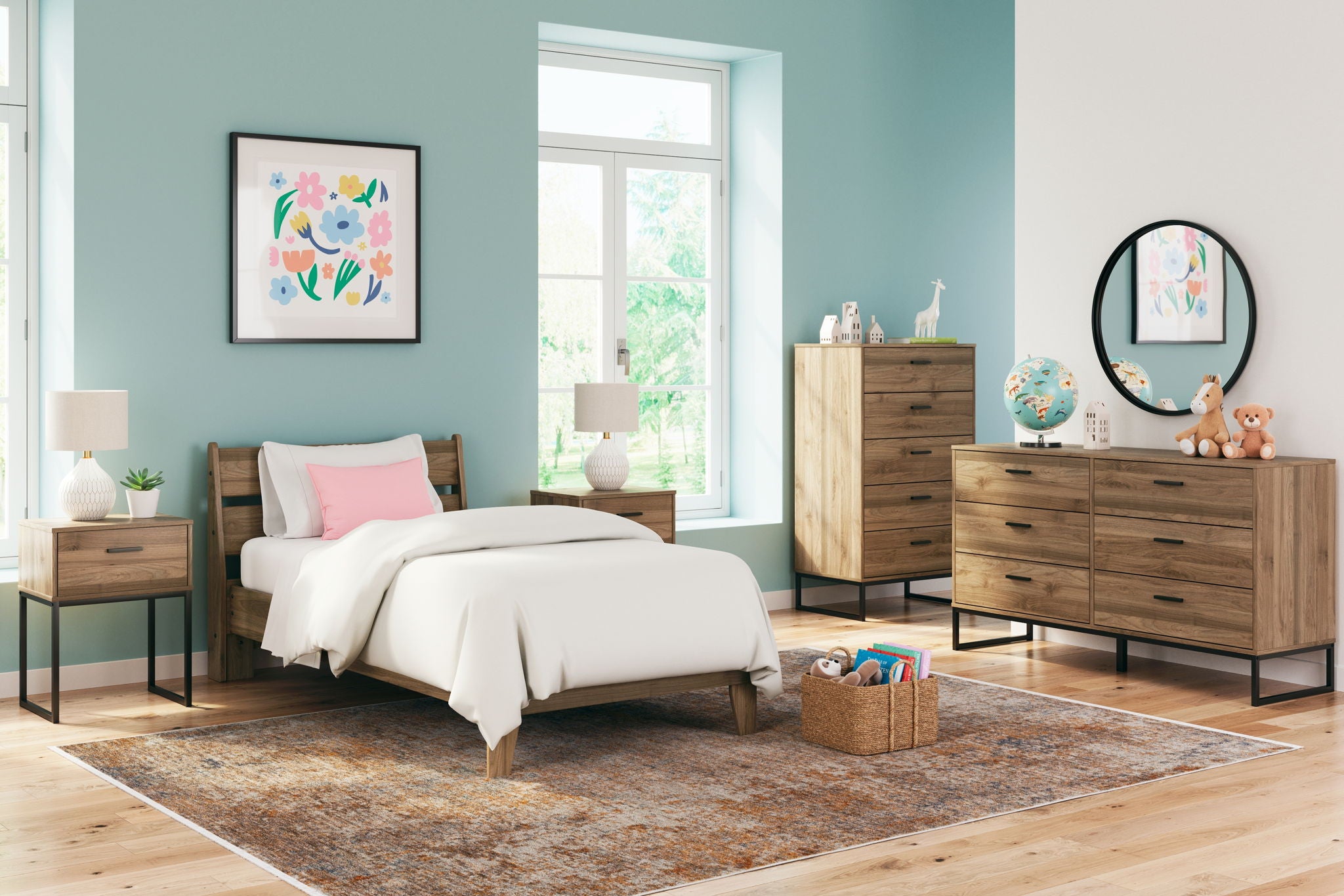 Light brown bed with nightstand and dresser, with round mirror