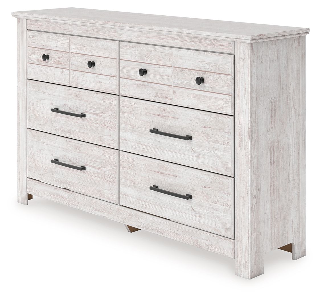 Whitewash six-drawer dresser with black bar pulls and round knob accents