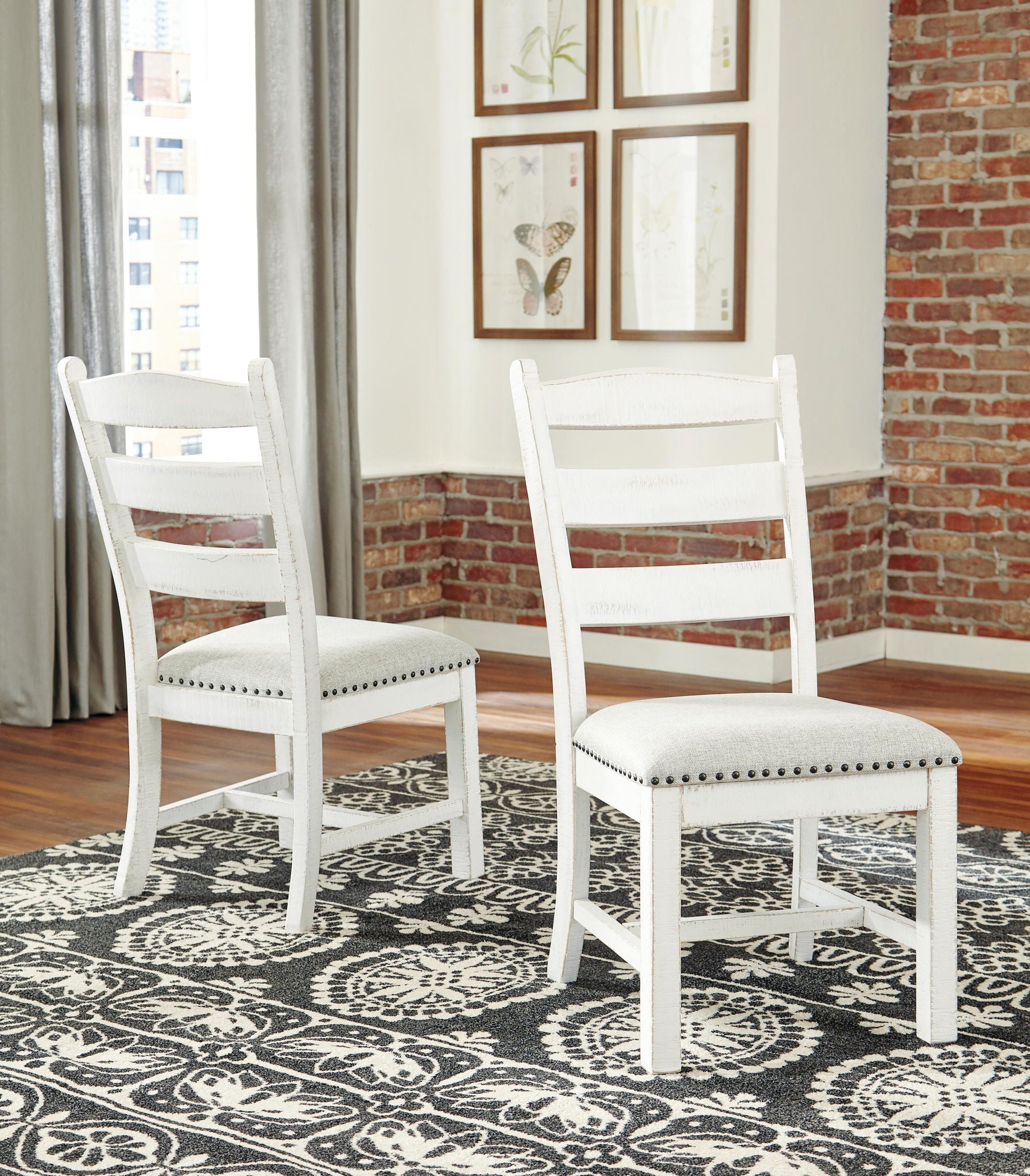 Set of 2 dining side chairs, white ladder-back design, beige seat with nailhead trim