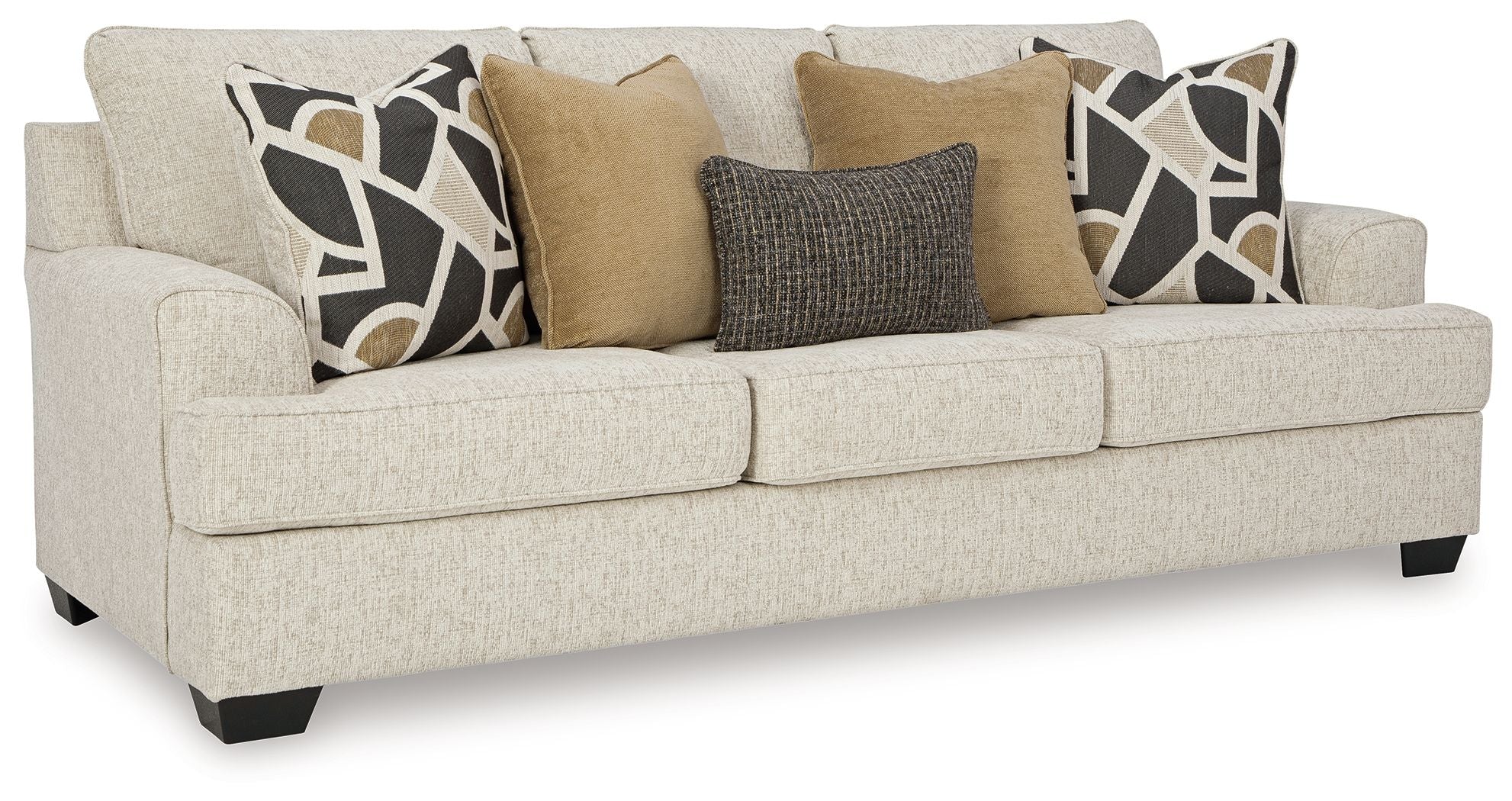 Beige upholstered sofa with three seat cushions and mixed patterned throw pillows