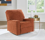 Rocker recliner chair in rust-orange upholstered fabric with curved back and arms.