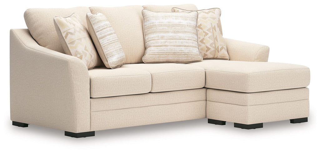 Upholstered sofa chaise in light beige fabric with block arms and squared chaise section.