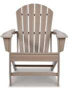 Driftwood Adirondack chair with slatted back, armrests, and front bar