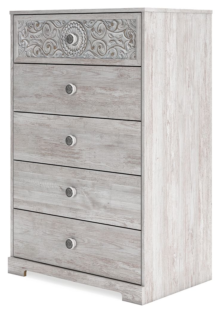 Whitewash chest of drawers with ornate top panel, five drawers, round metal knobs