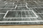 Elderland washable rug close-up of white-lined rectangles on dark gray pile
