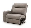 Gray upholstered power recliner with footrest; power base mechanism visible.