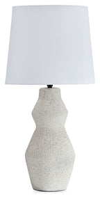 Cream table lamp with white fabric shade and speckled textured base