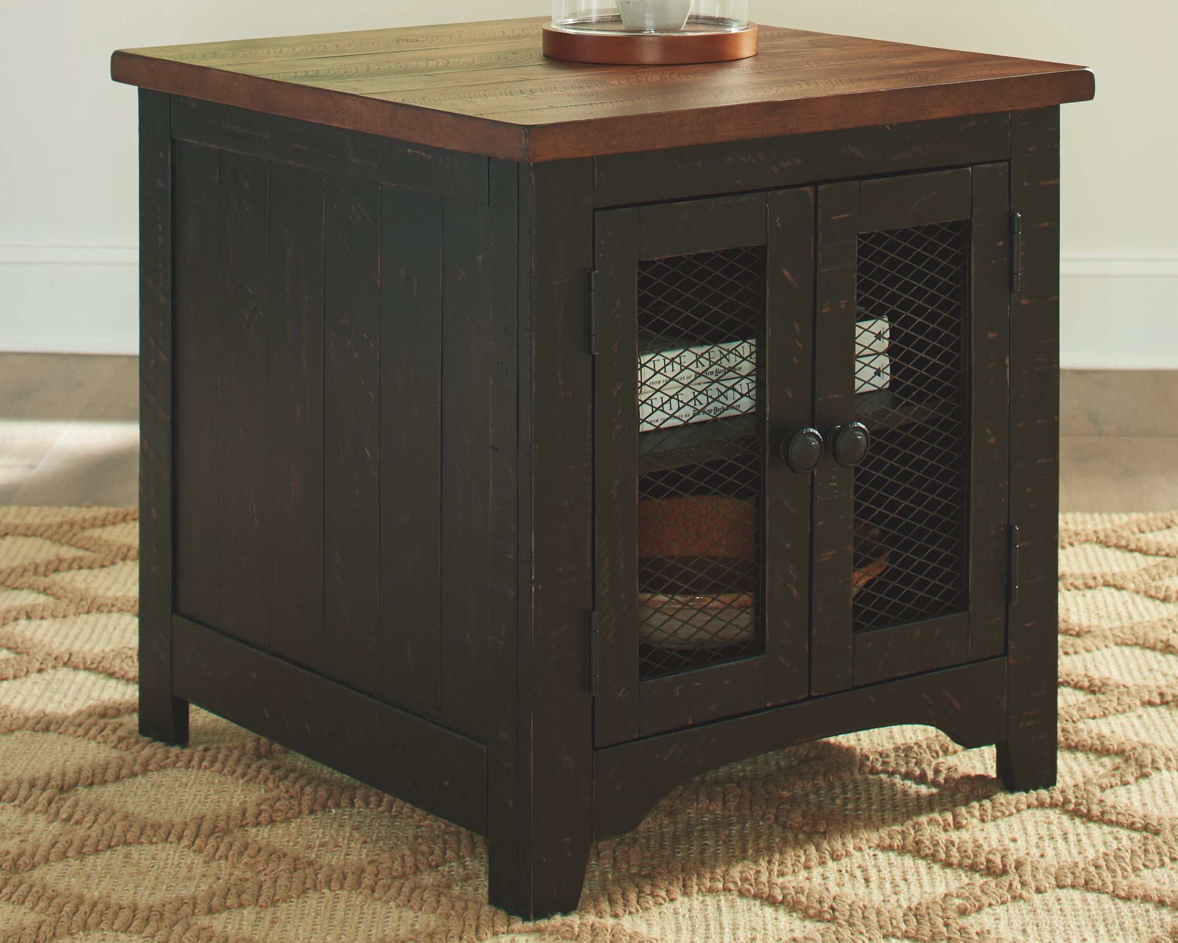 Rectangular end table with wire-mesh doors and warm wood top, dark cabinet body