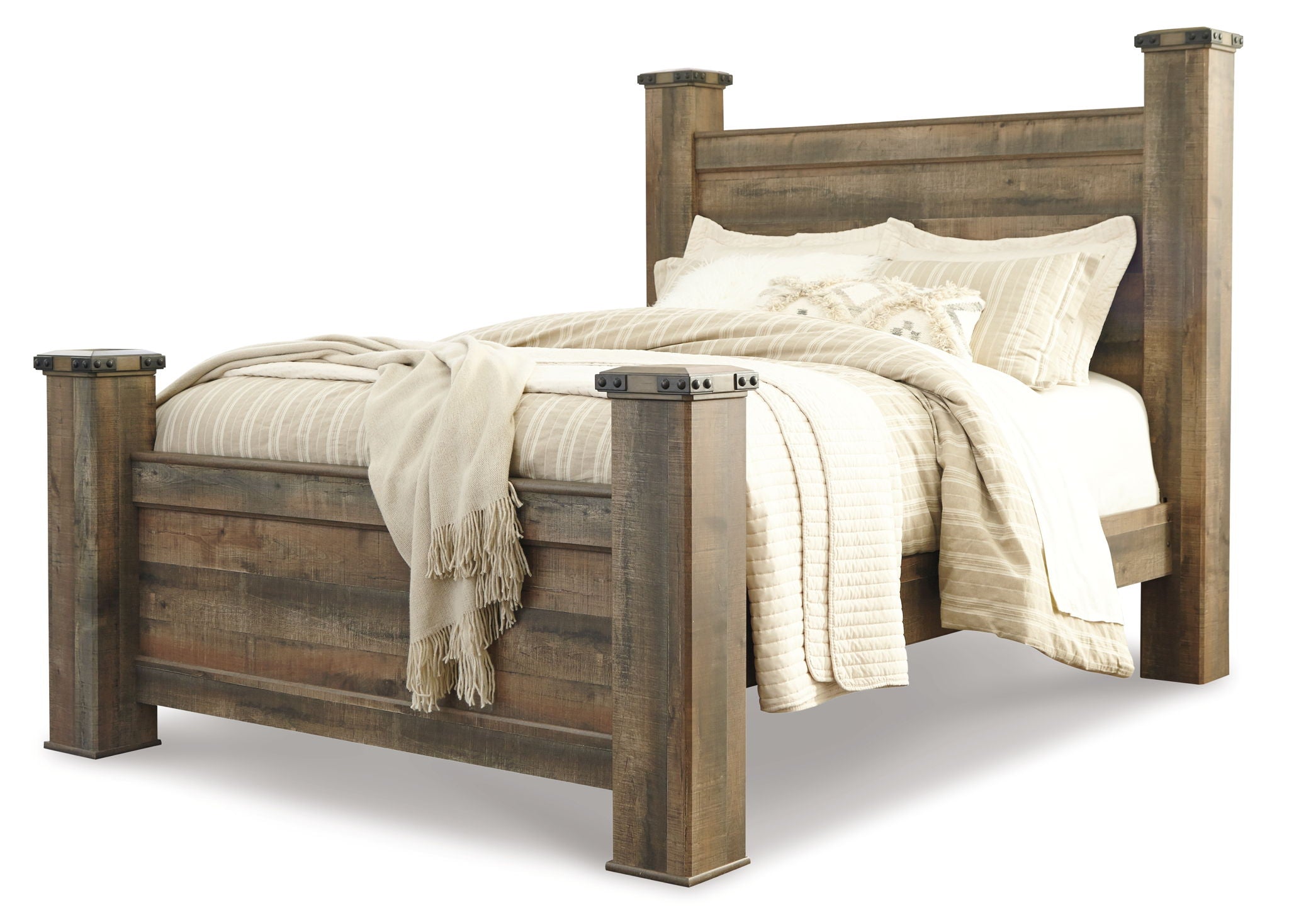 Dark brown poster bed with white linens and four corner posts