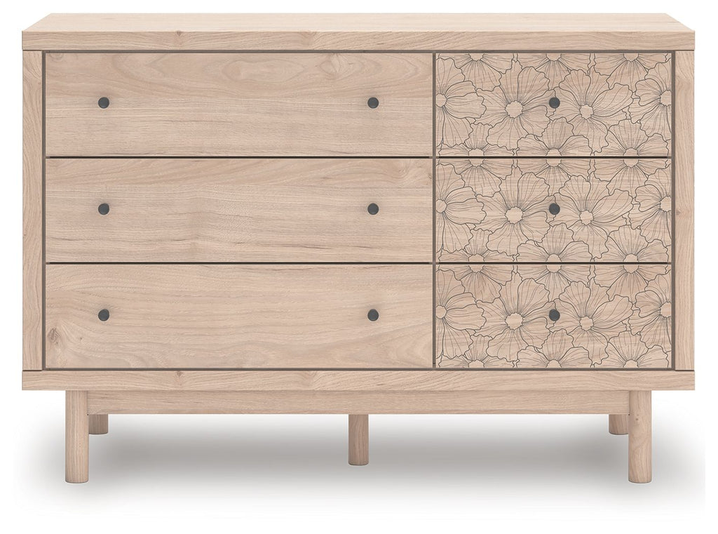 Wood dresser with three drawers and three floral-pattern cabinet drawers, dark knobs