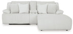 Light gray corduroy-style reclining sectional sofa with chaise and back pillows