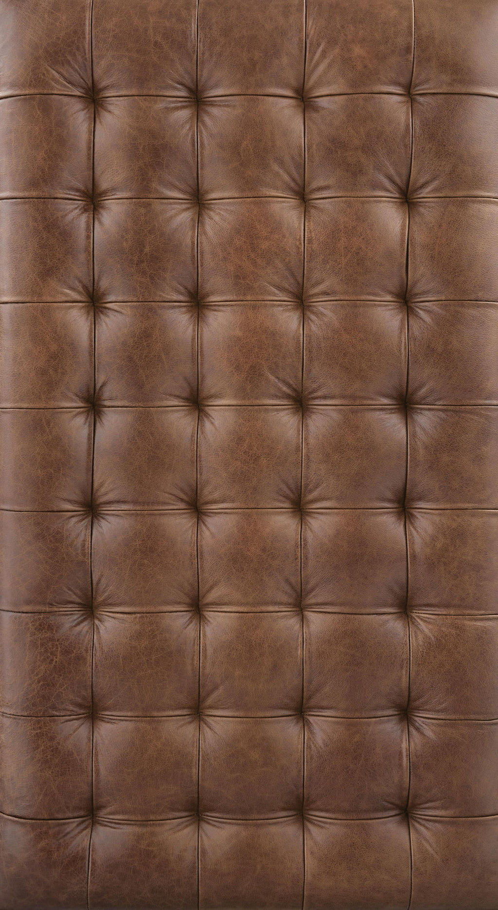Brown leather-look tufted upholstery with diamond stitching