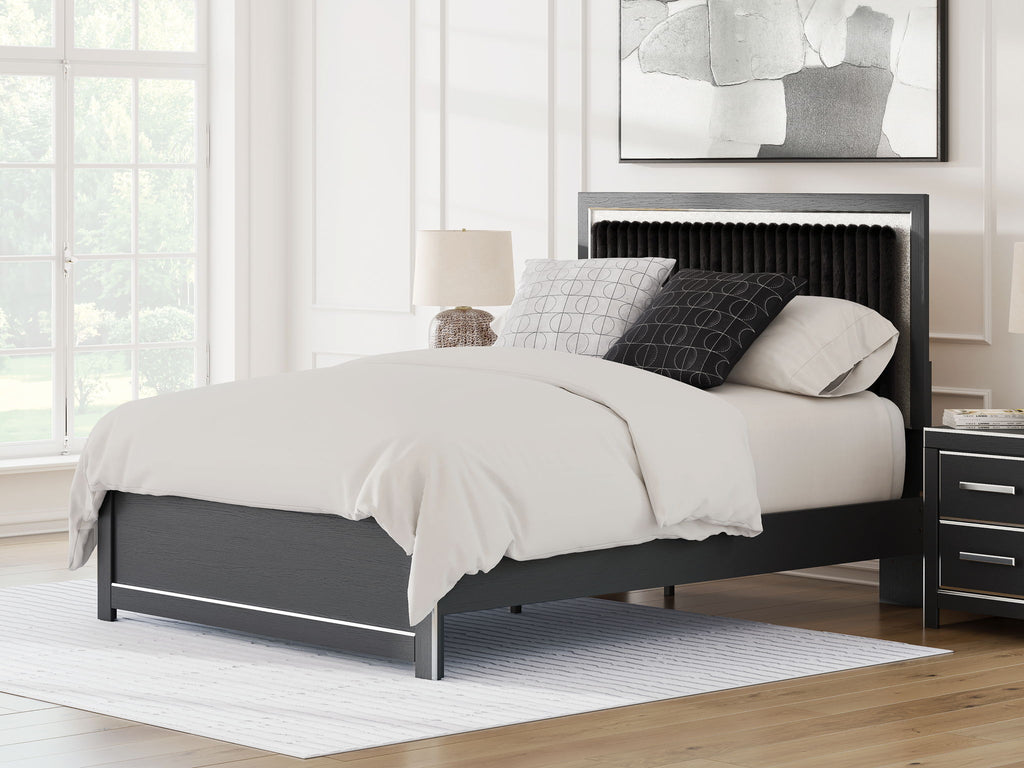 Dark upholstered panel platform bed with roll-slat headboard and side rails